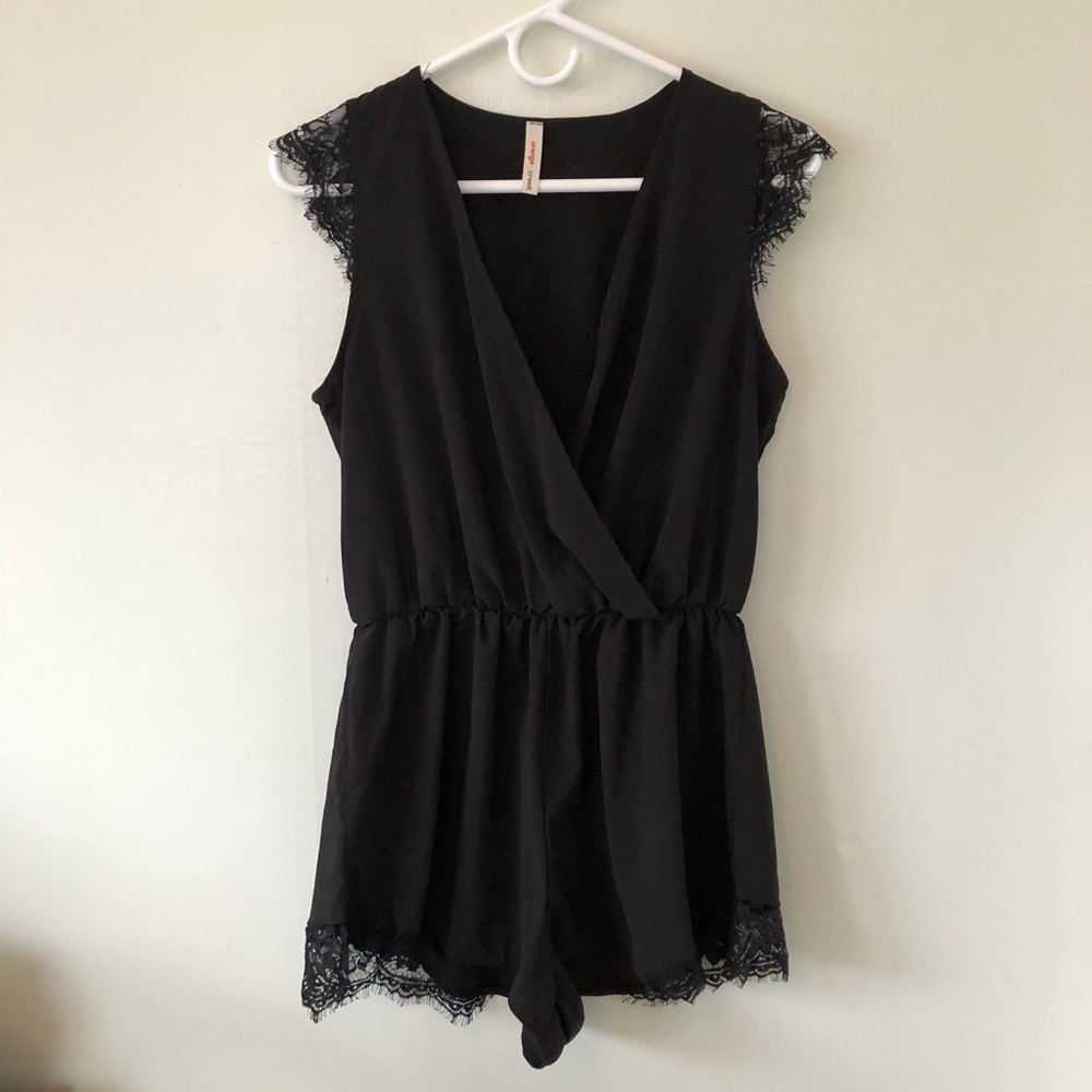 Black romper with lace details